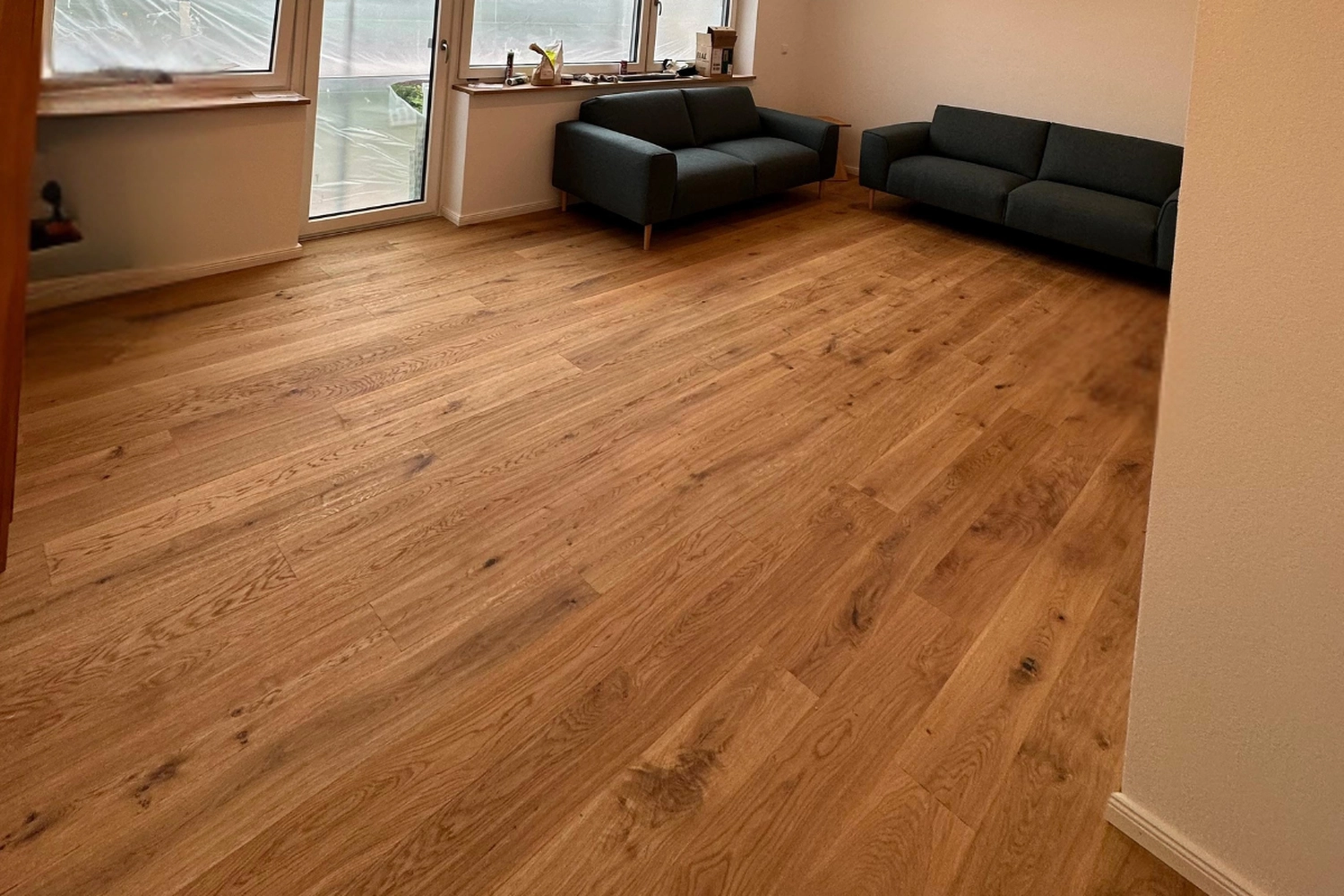 Karello Raumdesign - Bodenbelage - Parkettboden-Wohnzimmer-Wuerzburg