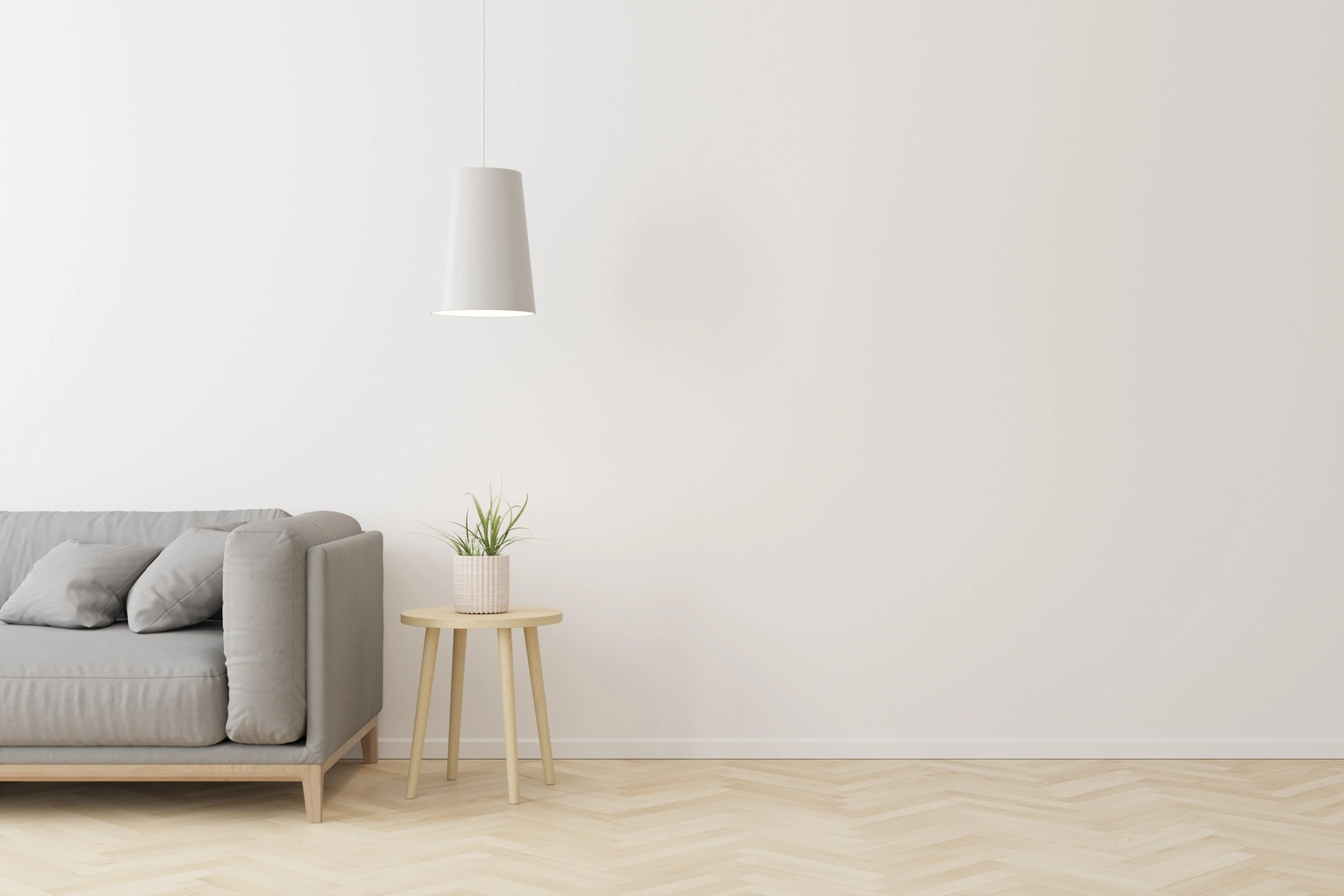 Karello Raumdesign - Innenausbau, Raumdesign und handwerkliche - Interieur eines Wohnzimmers im modernen Stil mit grauem Stoffsofa, hölzernem Beistelltisch und weißer Deckenleuchte auf Holzboden.